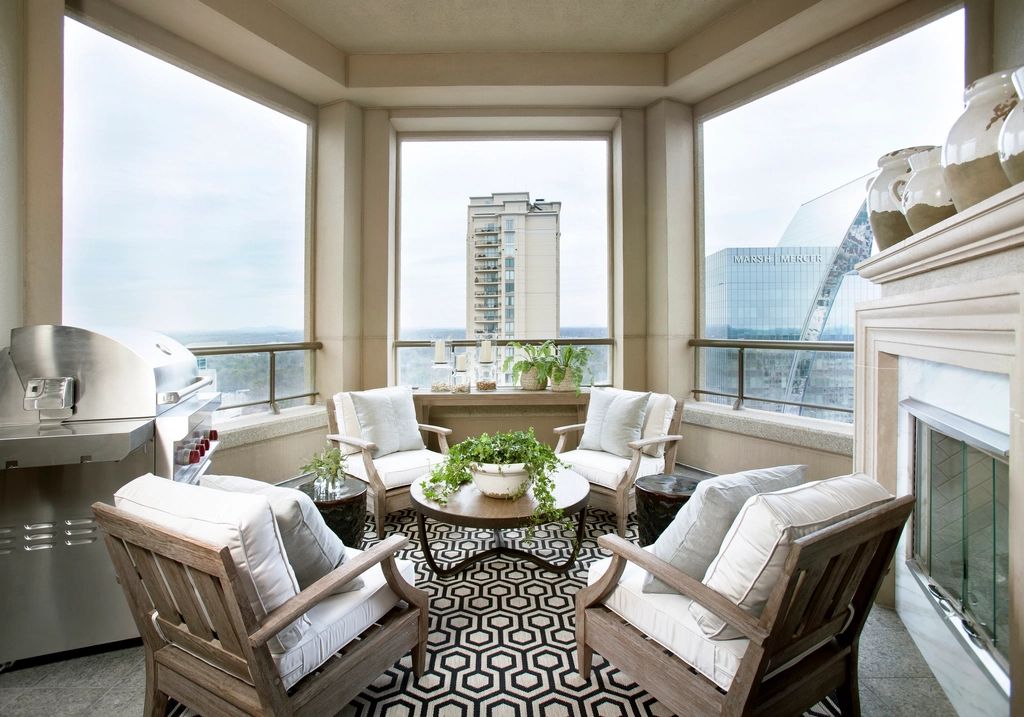 A private terrace with outdoor seating and a view